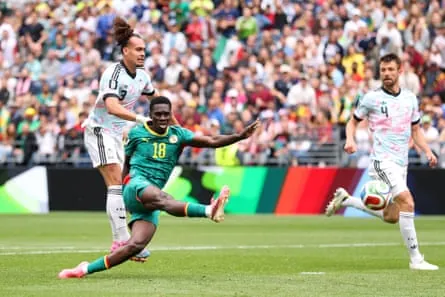 Ismaïla Sarr smashes the ball home to double Senegal’s lead.