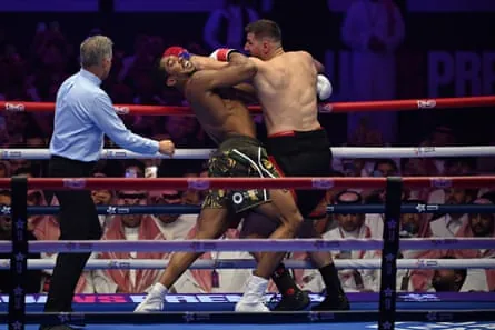 Kristian Prenga lands a punch on Anthony Joshua in Jeddah