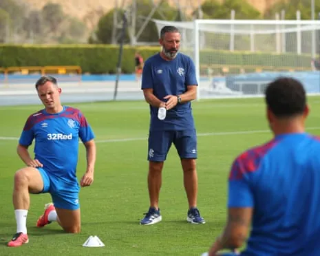 Rangers manager Derek McInnes talks with Lawrence Shankland and Emmanuel Fernandez during a pre-season trip to Spain