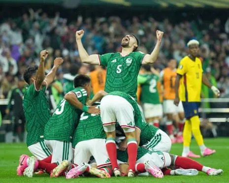 Mexico players celebrate after Raúl Jiménez scored